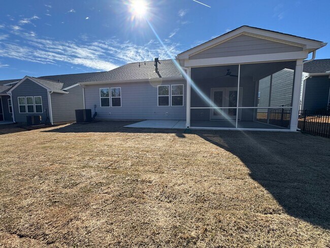 Building Photo - Spacious 1.5-Story 4BR Home with Bonus Room in Active 55+ Community