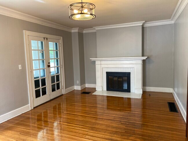 Very large living room with impressive fireplace - 3901 N Pennsylvania St