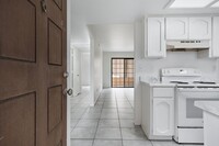 Building Photo - Freshly Updated Condo with In-Unit Laundry