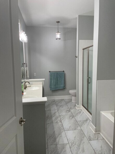 The bathroom and double-vanity - 145 Pier View St