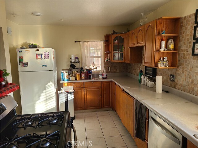 Building Photo - 11685 Holmes Ave