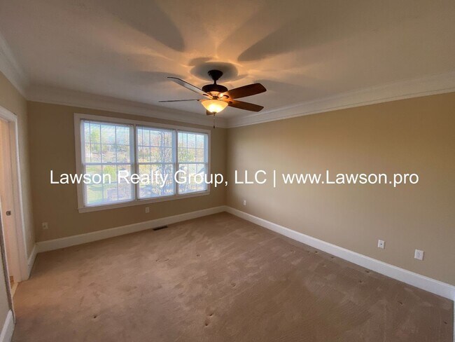 Building Photo - Colonial Green Row Home with Two Car Garage
