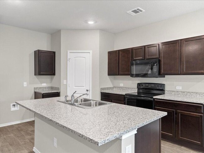 Building Photo - 6305 Wideleaf Dr