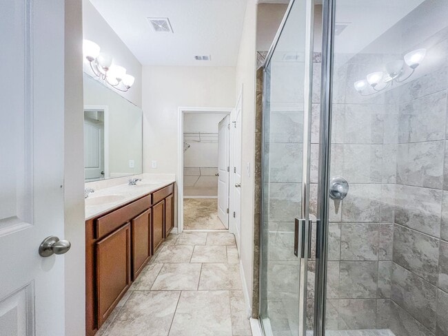 Building Photo - Spacious 4-Bedroom Townhome in Harmony – A Perfect Blend of Nature & Comfort!