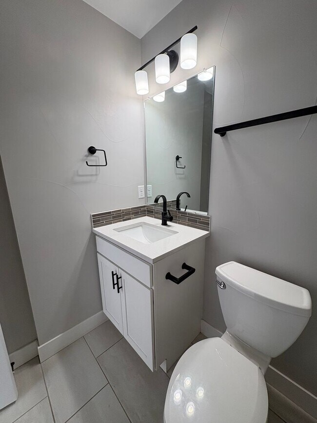 Building Photo - Modern 2 Bed + Flex Townhome with Rooftop Deck Near Paco Sanchez Park & Light Rail