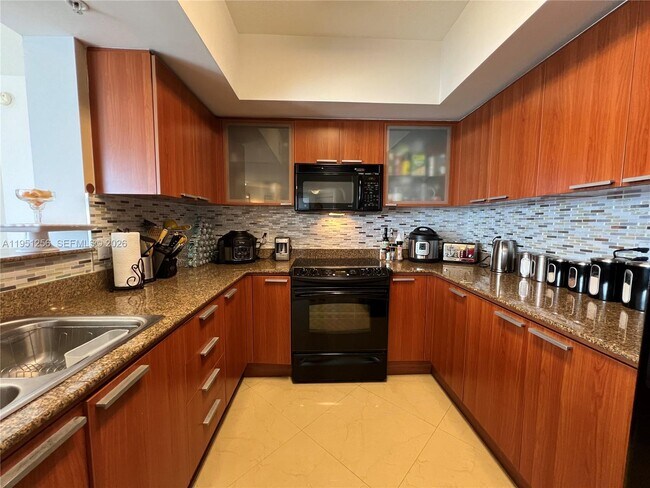 Building Photo - 16699 Collins Ave