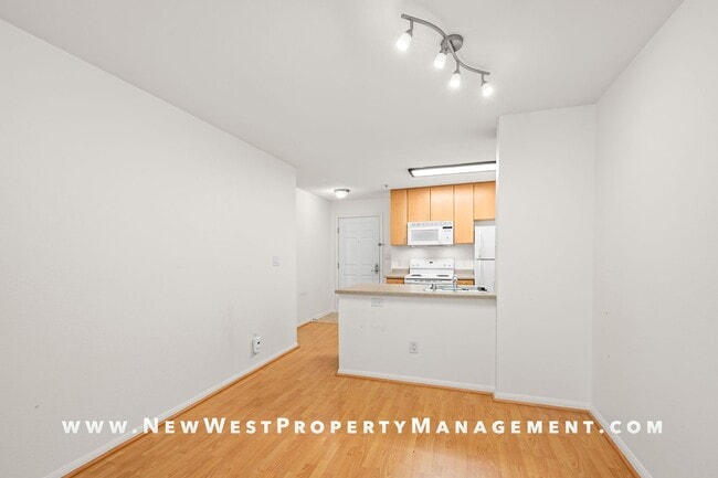 Building Photo - Charming Little Italy 1-Bedroom at Portico! Small Pet OK! Available Now!