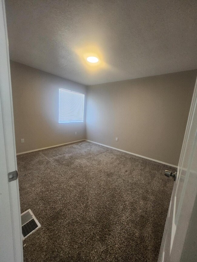Building Photo - 7720 Ranchwood Dr NW