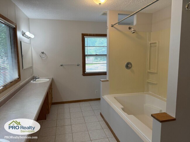 Building Photo - 4 Bedroom Home One Block from Medicine Lake