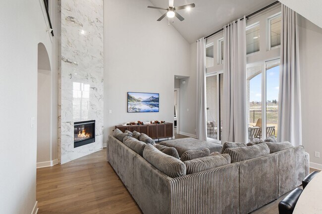 Building Photo - Stunning 4-Bedroom Luxury Residence with Bonus Office in the Prestigious Walsh Community LIKE NEW!