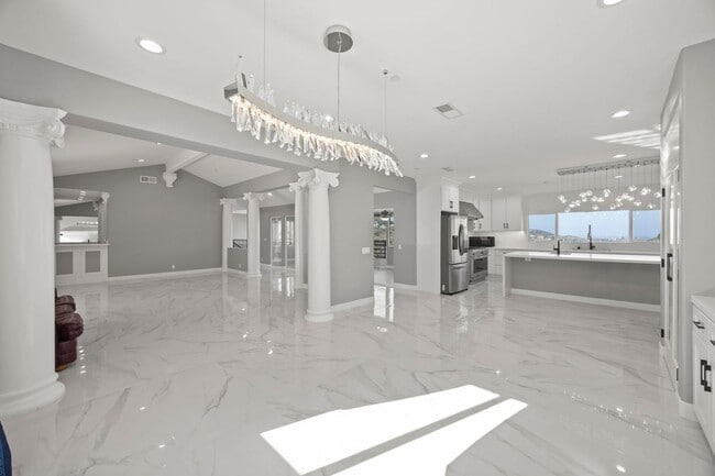 Building Photo - Modern Elegance Meets Scenic Privacy in Be...