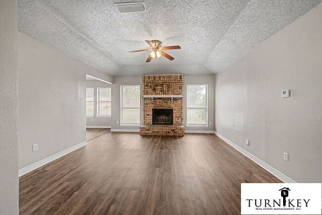 Building Photo - Cozy 3/2 Burleson Charmer | Wood-Burning Fireplace | 2-Car Garage | Pet-Friendly