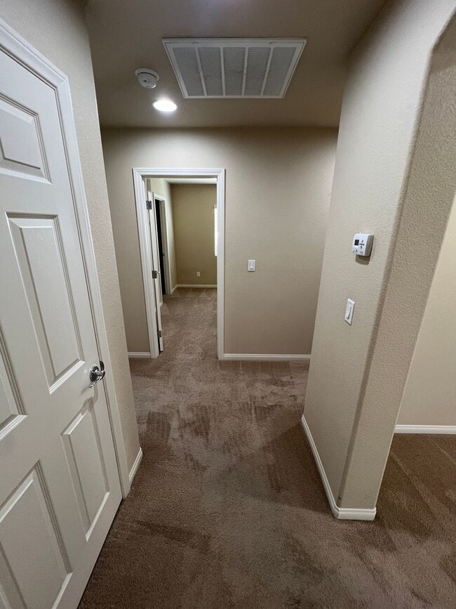 Building Photo - A Fantastic 4 Bedroom Home with the primary Downstairs, in Silverado Ranch