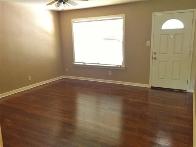 Building Photo - Remodeled 1 story home in Hurst with original plank wood flooring