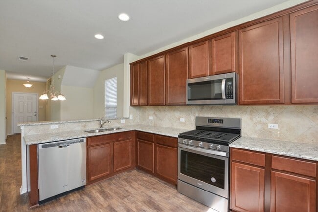 Building Photo - Inviting 4BD/3BA Rental Home with Walk-In Closet & Big Yard