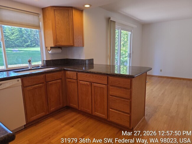 Building Photo - Twin Lakes life on a golf course -4 level home -  4 bedroom 2.5 bathroom with 2 car garage - Move...
