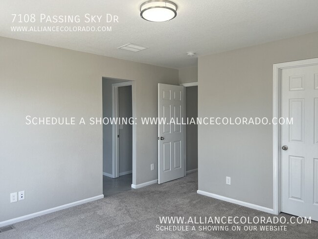 Building Photo - 7108 Passing Sky Dr