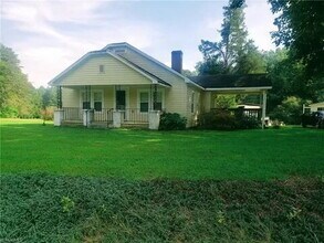 Building Photo - Updated 2 bedroom + finished attic space on an acre in davie county!