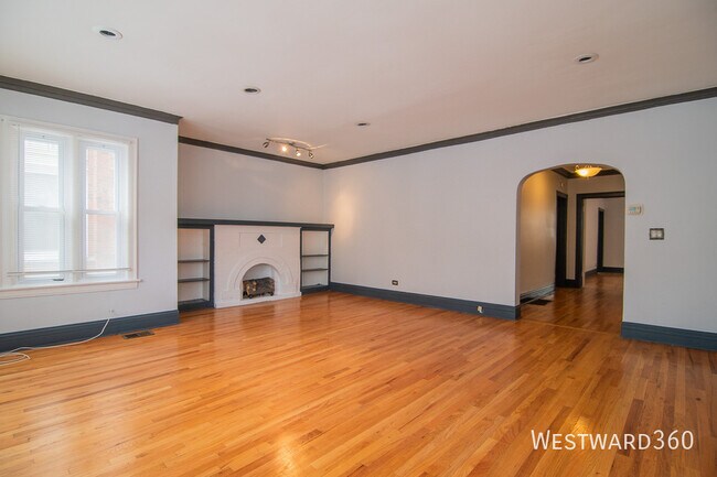 Building Photo - 7640 S Phillips-1
