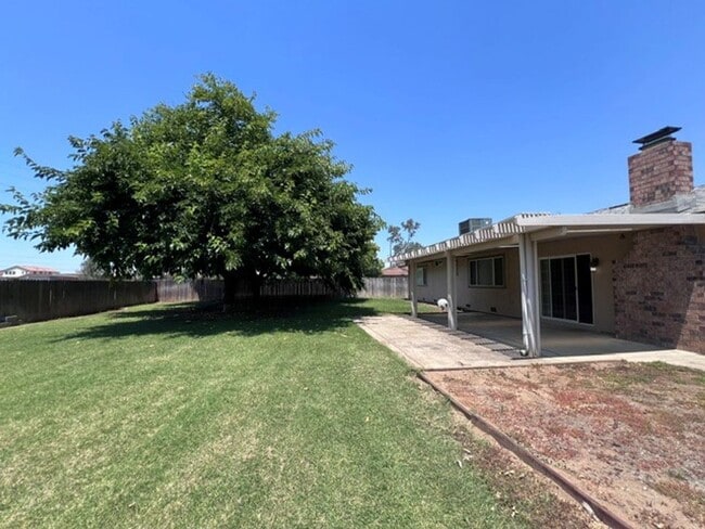 Building Photo - Freshly painted 4 bedroom home on over 2 acres of land.