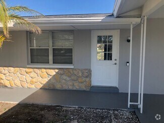 Building Photo - Tudor Dr Duplex
