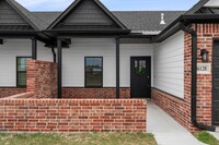 Building Photo - BRAND NEW, 3 BEDROOM DUPLEXES IN CHAFFEE C...