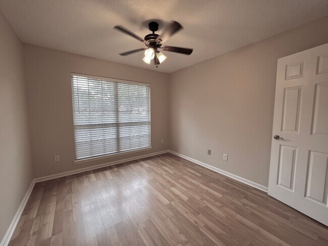 Building Photo - Behind the Gates: A Corner-Lot 4 bedroom, 2 bath Retreat in Coveted Pace Island!!