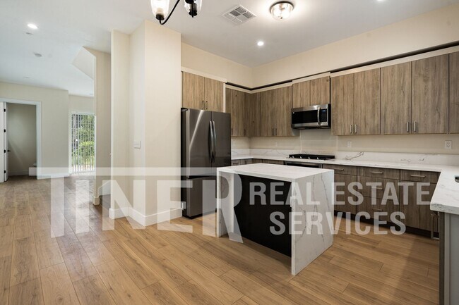 Building Photo - Elegant Modern Living