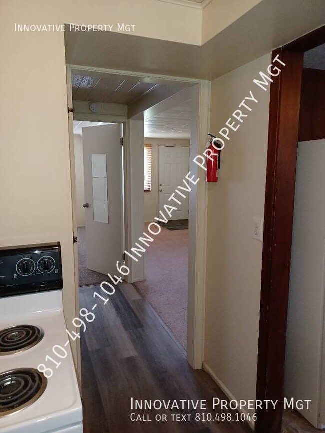 Building Photo - 5181 1/2 N. Elms-#1