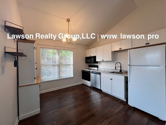 Building Photo - Adorable and Updated-One Level Living with Paved Driveway