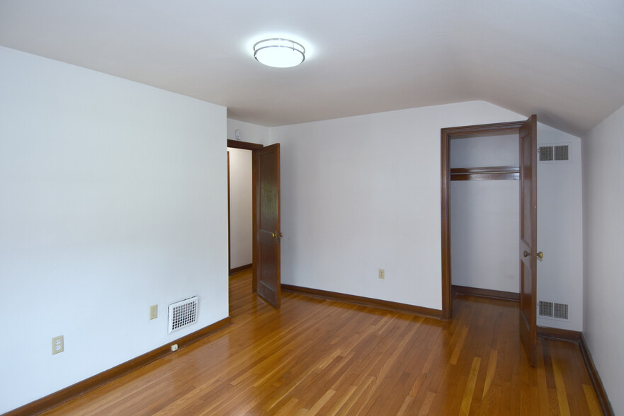 Bedroom #1 with spacious closet and new LED lighting - 210 E Garden Rd
