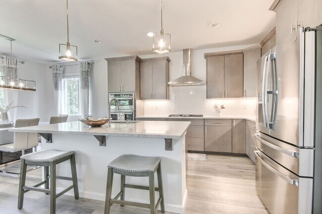 Building Photo - A true stunner in Tehaleh community!