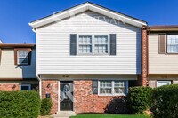 Building Photo - Venture outside to the expansive backyard,...