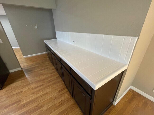 Building Photo - Spacious house with Skylights, Hardwood floors, Family room and Gardener