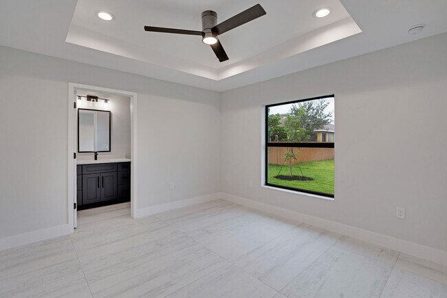 Building Photo - 2023 Duplex All tiled - 3 Bedroom Plus Den/2 Bath & 2 car Garage