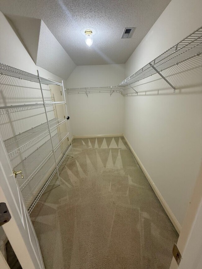 Building Photo - Spacious 5-Bedroom Home on a Corner Lot in...