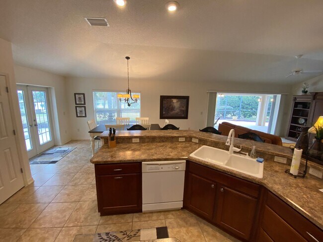 Building Photo - SEASONAL RENTAL. Large 4 Bed + 4 1/2 Baths Home, w/Views of the Jacaranda Golf Course and Lake in...