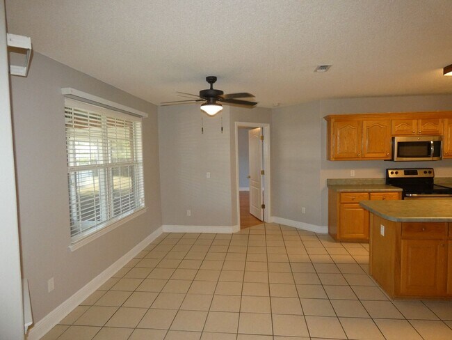 Building Photo - Charming 4-Bedroom Home With Sunroom