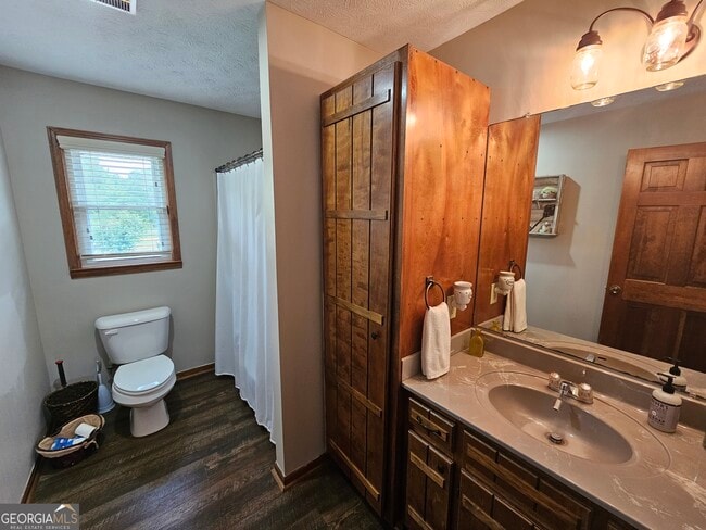 Building Photo - 6090 Strickland Town Rd