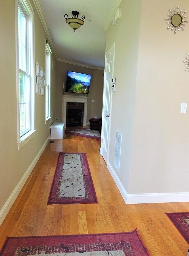 Hallway to living room - 24 Autumn Ln