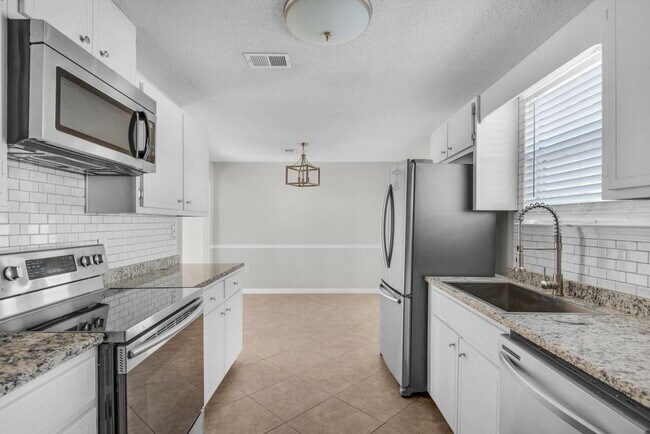 Building Photo - $300.00 Off First Months Rent!