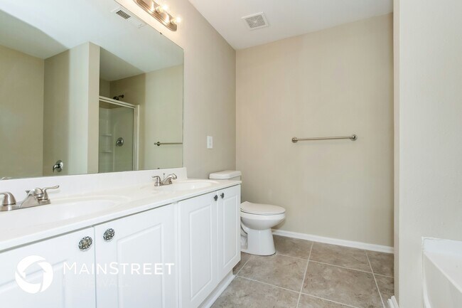 Building Photo - 7147 Wandering Creek Dr