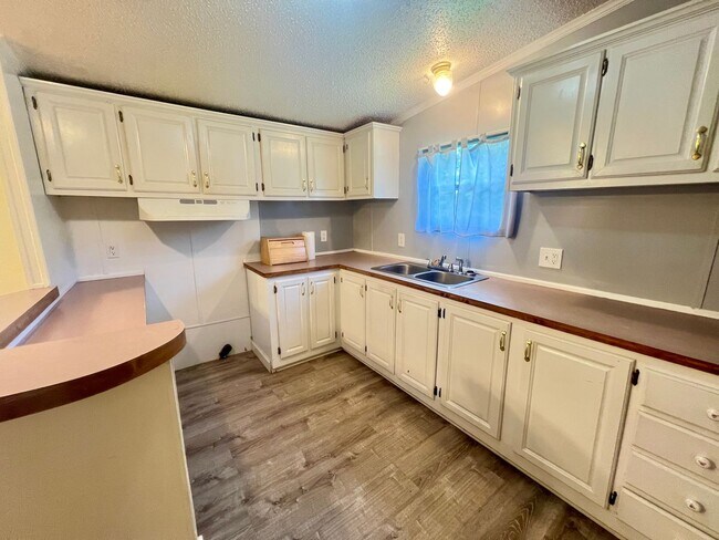 Building Photo - Stop Scrolling! Your New Home is Here!
