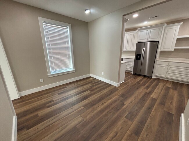 Building Photo - Welcome to this stunning new construction home located in the charming town of Atkins, AR.