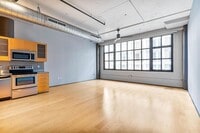 Building Photo - Stylish, south-facing 1-bdrm/1-bath loft in the Pearl—Deeded parking & storage