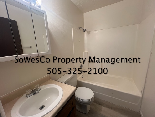 Building Photo - Brand New flooring & Paint; 2 Bedroom 1.5 ...