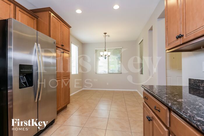 Building Photo - 7044 W Alicia Dr