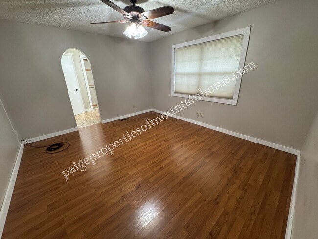 Building Photo - Charming 3 Bedroom, 2 Bath Home with Sunroom, Garage & Privacy-Fenced Yard