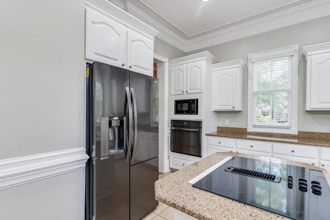 Building Photo - Beautiful home in Lake Carolina Harborside with Fully Equipped Private Apartment
