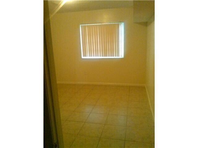Building Photo - 3241 Sabal Palm Manor